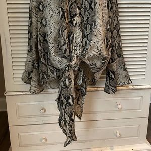 A snake print blouse.